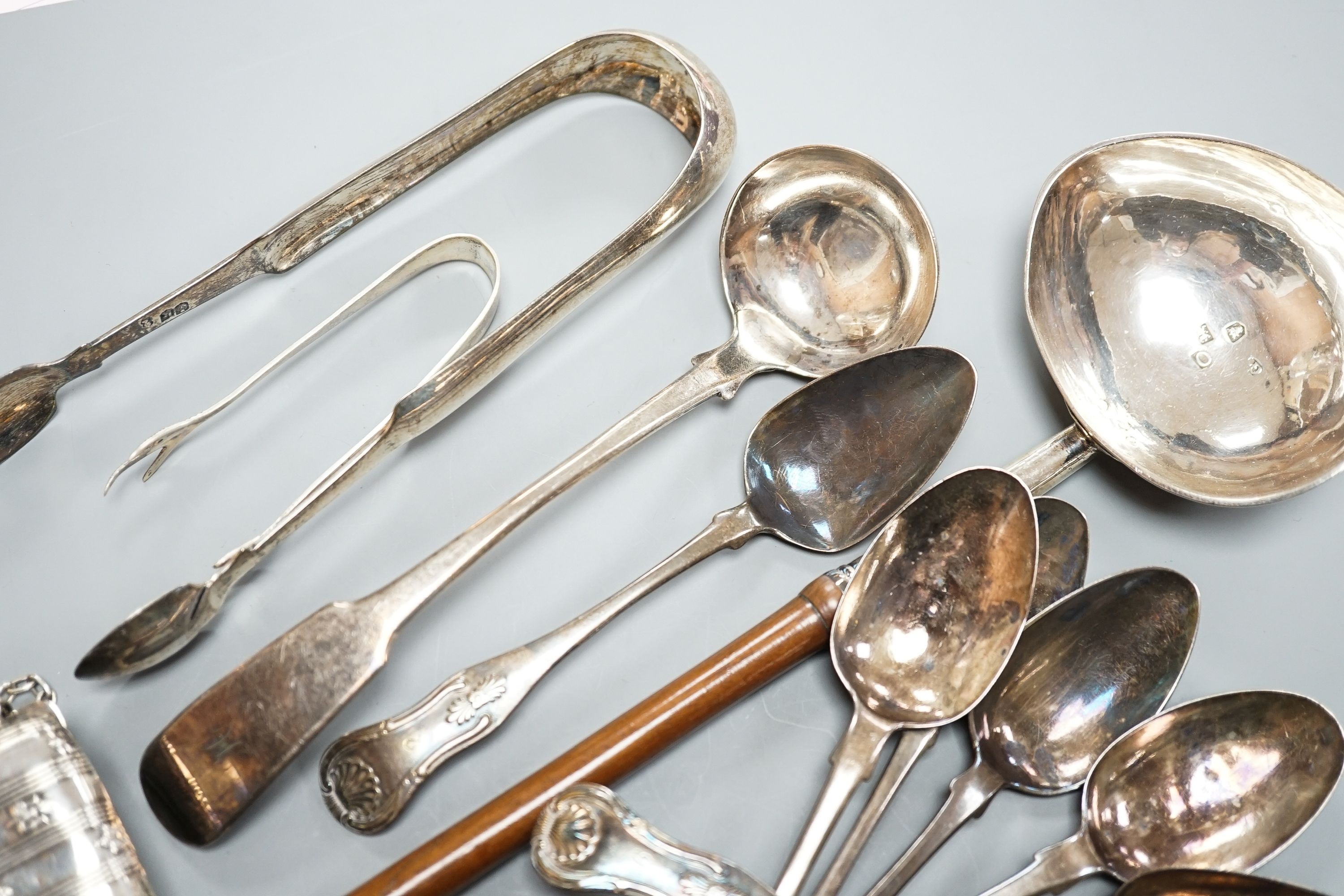 An 18th century silver toddy ladle, with wooden handle(a.f.) and a group of small silver including flatware, napkin ring, scent bottle, repousse box and cover and purse.